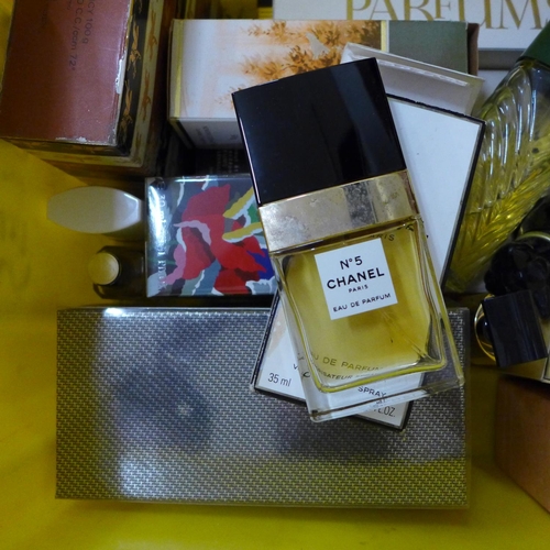 A collection of perfumes, Chanel No.5, YSL, Vanderbilt, some used