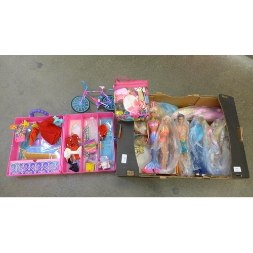 749 - A collection of Barbie dolls and accessories