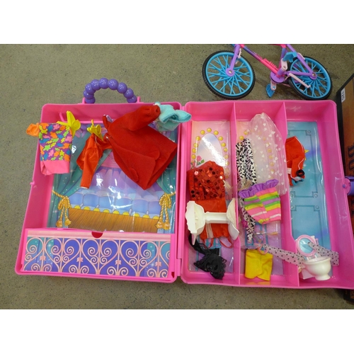 749 - A collection of Barbie dolls and accessories