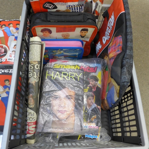 756 - A collection of One Direction ephemera including annuals, CDs, sticker books, etc.