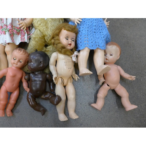 759 - A jointed Teddy bear and a collection of dolls including Roddy and BND