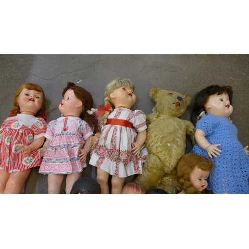 759 - A jointed Teddy bear and a collection of dolls including Roddy and BND