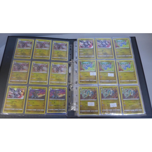 763 - 225 Holographic Pokemon cards in folder in sleeves