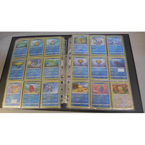 763 - 225 Holographic Pokemon cards in folder in sleeves