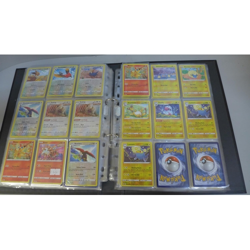 763 - 225 Holographic Pokemon cards in folder in sleeves