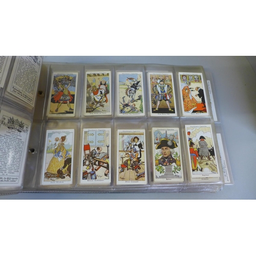 766 - Cigarette cards; ten complete sets of cigarette cards in album, including Mitchells Clan Tartans, Ar... 