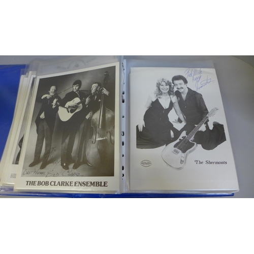 769 - An album of over 100 signed photographs of entertainers, ventriloquists, etc.