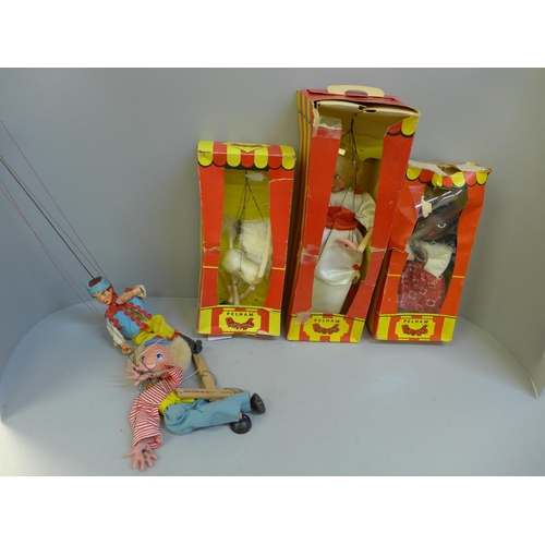 775 - Five Pelham puppets, three boxed, boxes a/f