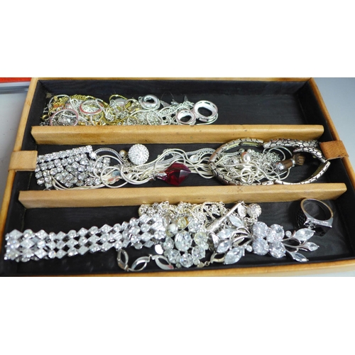 792 - A tray of earrings, other costume jewellery and some items of silver