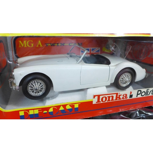 794 - Five 18th scale model vehicles, boxed, including Burago, Lancia and Tonka Polistil MG A