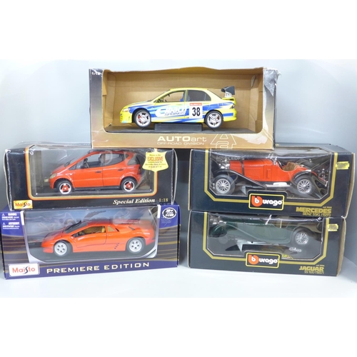 796 - Five 18th scale model vehicles, boxed, including Burago, Mercedes Benz SSKL and Auto Art Toyota Harr... 