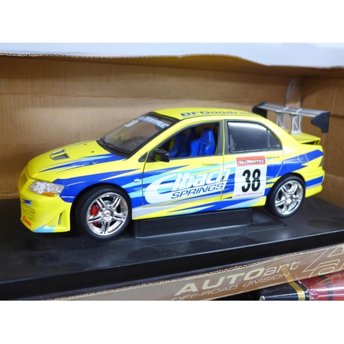 796 - Five 18th scale model vehicles, boxed, including Burago, Mercedes Benz SSKL and Auto Art Toyota Harr... 