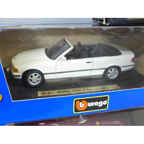 800 - Five large model vehicles, boxed, including Burago