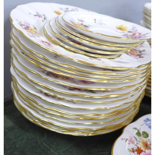 801 - A collection of Royal Crown Derby Derby Posies dinner and teaware, including eleven dinner plates, f... 