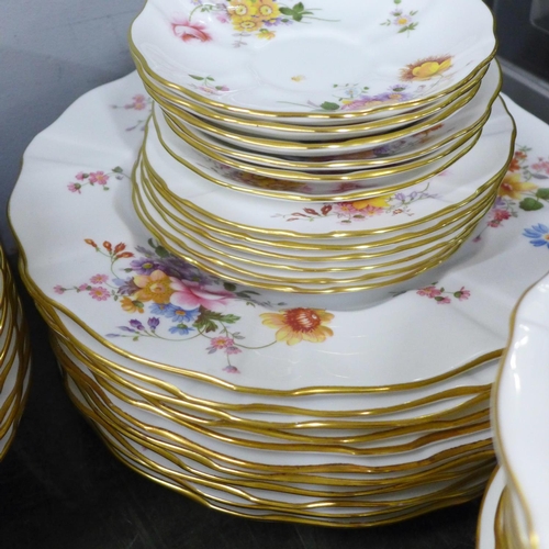 801 - A collection of Royal Crown Derby Derby Posies dinner and teaware, including eleven dinner plates, f... 