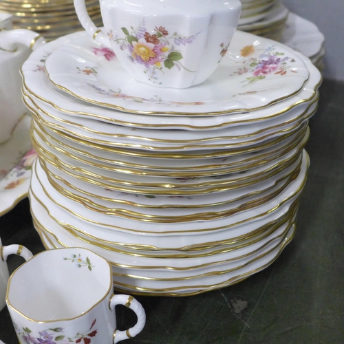 801 - A collection of Royal Crown Derby Derby Posies dinner and teaware, including eleven dinner plates, f... 