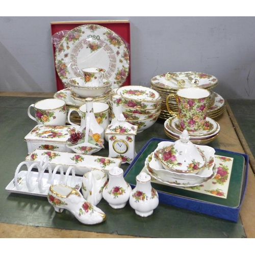 805 - A box of Royal Albert Old Country Roses, three tier cake stand, mugs, bowls, four dinner plates, sev... 