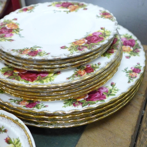 805 - A box of Royal Albert Old Country Roses, three tier cake stand, mugs, bowls, four dinner plates, sev... 