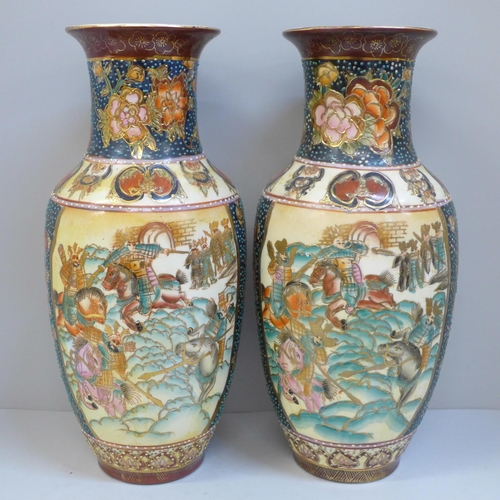 818 - A pair of oriental vases