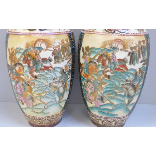 818 - A pair of oriental vases