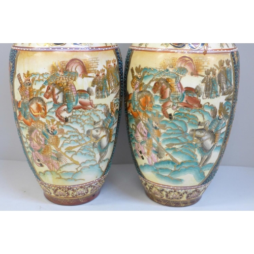 818 - A pair of oriental vases