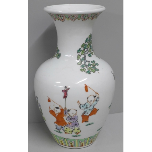 830 - An oriental vase, mark to the base, 26.5cm