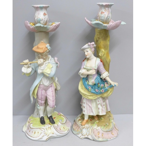 838 - Two continental figural candlesticks