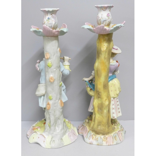 838 - Two continental figural candlesticks