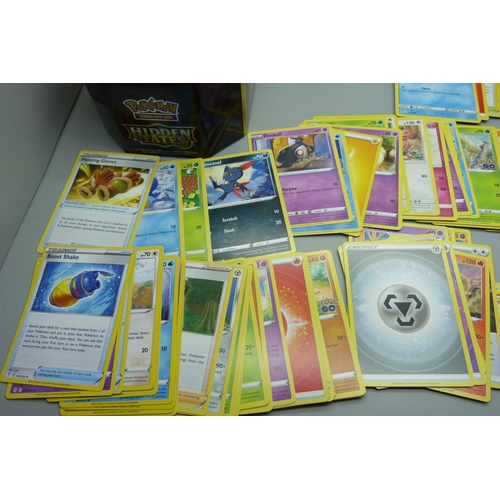 872 - 30 Reverse Holo/Holo Pokemon cards and 300 common/uncommon and rare cards in tin