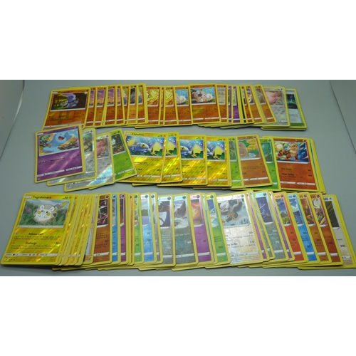 874 - 100 Reverse holographic Pokemon cards, multiple sets