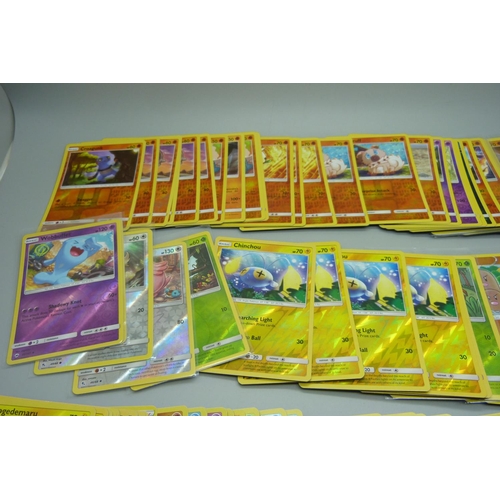 874 - 100 Reverse holographic Pokemon cards, multiple sets