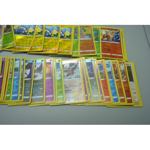 874 - 100 Reverse holographic Pokemon cards, multiple sets