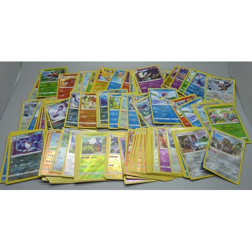 875 - 100 Reverse holographic Pokemon cards, multiple sets