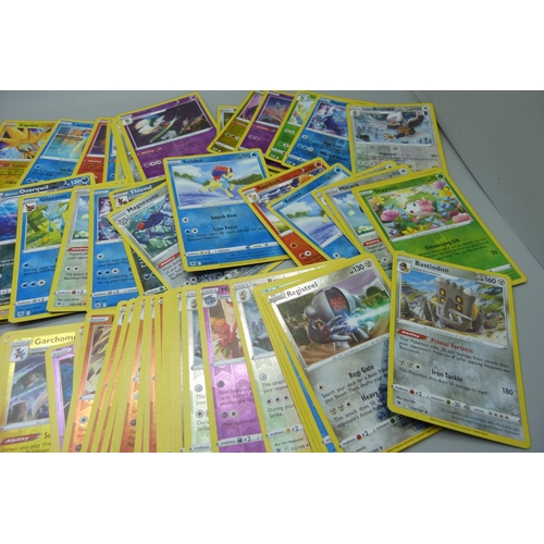 875 - 100 Reverse holographic Pokemon cards, multiple sets