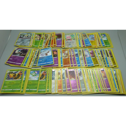 876 - 100 Reverse holographic Pokemon cards, multiple sets