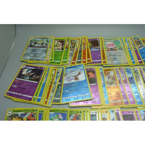 876 - 100 Reverse holographic Pokemon cards, multiple sets