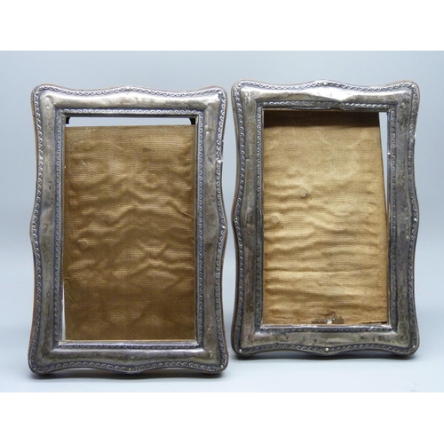 881 - A pair of silver photograph frames, a/f,  Birmingham 1920