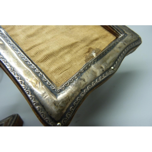 881 - A pair of silver photograph frames, a/f,  Birmingham 1920