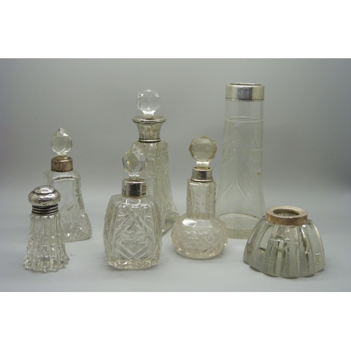 886 - Silver mounted scent bottles, etc.