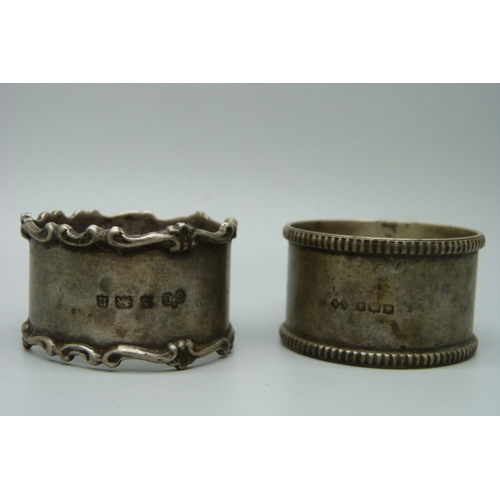 887 - Two silver napkin rings and a silver bracelet, 73g