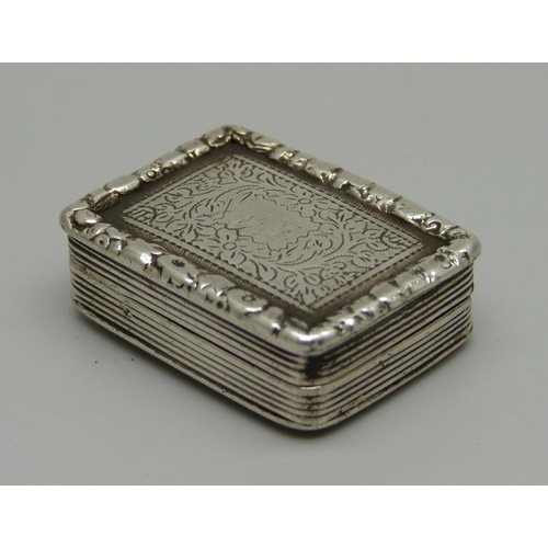 900 - A George III silver vinaigrette, Birmingham 1810, maker T.S. for Thomas Shaw, inside lid bears scrat... 