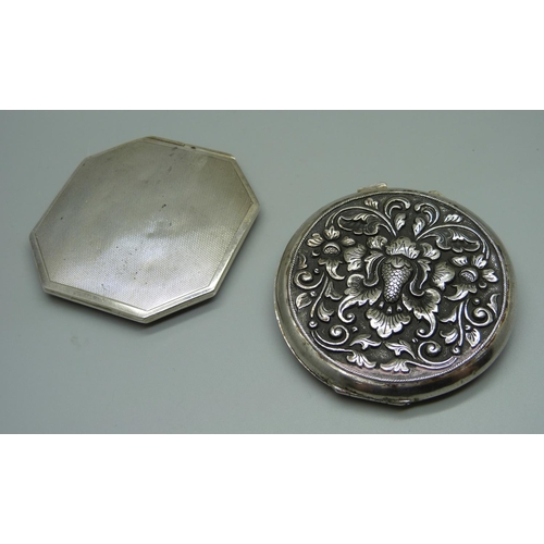 907 - Two silver compacts, one 800, one hallmarked, (one a/f, dented)