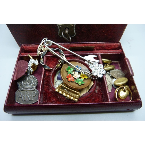 931 - Costume jewellery, a pair of silver cufflinks, a silver ARP badge, etc.