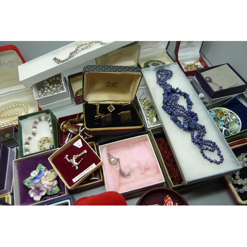 940 - A collection of costume jewellery including some silver items