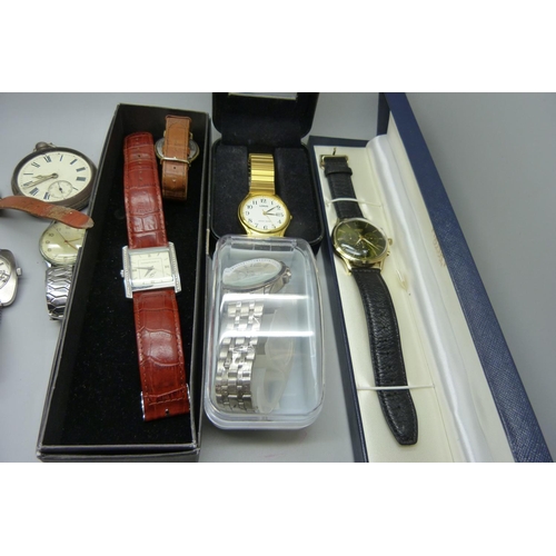 945 - A collection of wristwatches and pocket watches including two silver, Smiths, Swatch, etc.