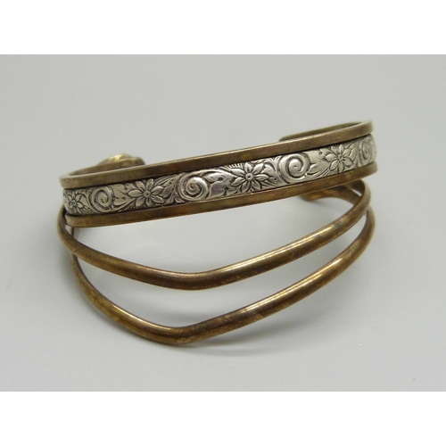 955 - A Renee Lepre (French designer) copper and sterling silver bangle