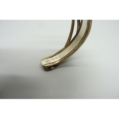 955 - A Renee Lepre (French designer) copper and sterling silver bangle