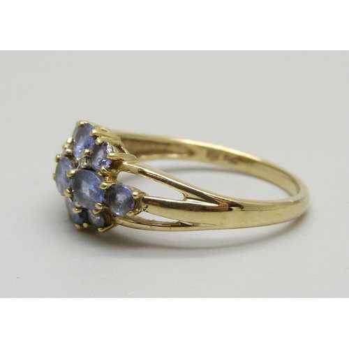 963 - A 9ct gold and tanzanite cluster ring, 2.2g, N