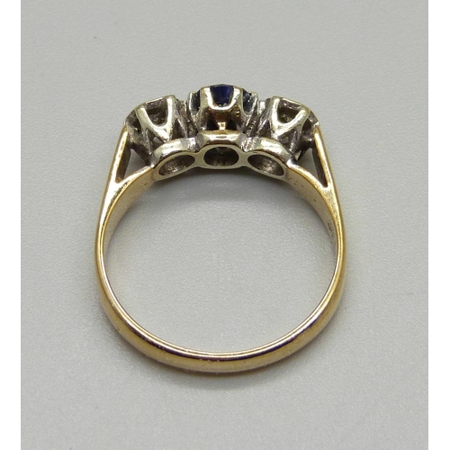 965 - A 9ct gold, sapphire and diamond ring, 3.2g, M