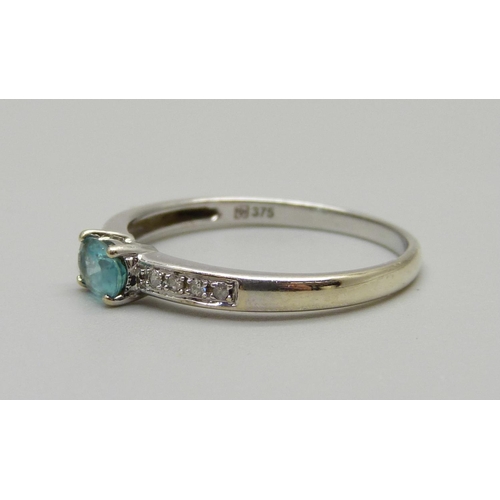 969 - A 9ct gold, aquamarine and eight diamond ring, 2.3g, W